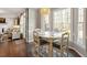 Bright breakfast nook with large windows and stylish seating at 3908 Yateswood Ct, Raleigh, NC 27603
