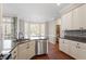 Open concept kitchen featuring stainless steel appliances, stone countertops and breakfast nook at 3908 Yateswood Ct, Raleigh, NC 27603