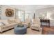 Inviting living room with stylish furnishings and seamless flow to the outdoors at 3908 Yateswood Ct, Raleigh, NC 27603