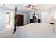 This main bedroom features carpeted floors, light blue walls, ceiling fan, and brown furniture at 3908 Yateswood Ct, Raleigh, NC 27603