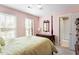 Main bedroom featuring window and wooden furniture and carpeted floor at 3908 Yateswood Ct, Raleigh, NC 27603