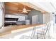 Outdoor kitchen features a bar, grill, and cabinets at 3908 Yateswood Ct, Raleigh, NC 27603