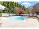Inviting swimming pool with a diving board in a private backyard setting at 3908 Yateswood Ct, Raleigh, NC 27603