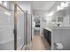 This spacious bathroom features a glass shower and double sink vanity at 405 Club Center Dr, Youngsville, NC 27596