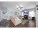 Comfortable living room with a fireplace and lots of natural light at 405 Club Center Dr, Youngsville, NC 27596