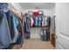Walk-in closet with organized shelving and hanging space at 405 Club Center Dr, Youngsville, NC 27596