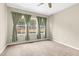 Bedroom with neutral walls and large windows allowing natural light at 425 Summit Trail Dr, Hillsborough, NC 27278