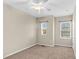 Cozy bedroom with neutral paint and carpeted floors at 425 Summit Trail Dr, Hillsborough, NC 27278