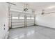 Spacious two-car garage with epoxy flooring and automatic door openers ready for your vehicles and projects at 425 Summit Trail Dr, Hillsborough, NC 27278