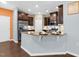 Well-equipped kitchen with granite countertops, stainless steel appliances, and ample cabinet space at 425 Summit Trail Dr, Hillsborough, NC 27278