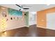 Eclectic living room featuring colorful accents, modern lighting and lots of natural light at 425 Summit Trail Dr, Hillsborough, NC 27278