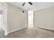 Neutral loft area with carpet floors and ceiling fan at 425 Summit Trail Dr, Hillsborough, NC 27278
