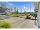 Charming street view showcases well-maintained homes with lush landscaping, and ample parking at 425 Summit Trail Dr, Hillsborough, NC 27278