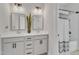 Bright bathroom featuring double vanity with modern fixtures, square mirrors, and a shower tub at 4905 Abundance Ave, Raleigh, NC 27616
