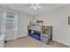 Bedroom showcasing a twin over full bunk bed with stairs and built-in storage at 4905 Abundance Ave, Raleigh, NC 27616