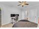 Comfortable bedroom featuring a ceiling fan, perfect for creating a cozy and relaxing atmosphere at 4905 Abundance Ave, Raleigh, NC 27616