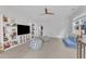 Spacious bonus room perfect for entertaining, with a television and cozy beanbag chairs at 4905 Abundance Ave, Raleigh, NC 27616