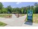 River Bend Park sign showing a walking map, a shelter, a playground, and green space for residents to enjoy at 4905 Abundance Ave, Raleigh, NC 27616