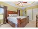 Spacious main bedroom with ample natural light, and tray ceiling at 495 Evans Rd, Princeton, NC 27569