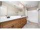 Bathroom featuring double sinks with a light wood vanity and a tub and shower combo at 502 Sippihaw Oaks Dr, Fuquay Varina, NC 27526