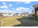 Expansive backyard featuring a well-maintained lawn and secure black fencing at 517 Edenfield Dr, Fuquay Varina, NC 27526