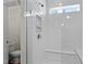 Bright shower features white subway tile, a window, and built-in shower seat at 517 Edenfield Dr, Fuquay Varina, NC 27526