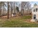 Spacious backyard with playset and shed, perfect for outdoor fun at 520 Tall Oaks Dr, Durham, NC 27713
