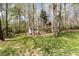 Backyard with playset and storage shed at 520 Tall Oaks Dr, Durham, NC 27713