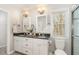 Bathroom with a double vanity, granite countertops, and modern fixtures, perfect for a growing Gathering at 520 Tall Oaks Dr, Durham, NC 27713