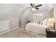 Bedroom with neutral paint, vaulted ceiling, ceiling fan and carpet flooring at 520 Tall Oaks Dr, Durham, NC 27713