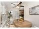 Inviting breakfast nook with lots of light from many windows and a view of the kitchen at 520 Tall Oaks Dr, Durham, NC 27713
