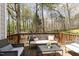 Relax on this lovely deck with wooded views at 520 Tall Oaks Dr, Durham, NC 27713