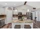 Open kitchen with granite island, stainless appliances, and lots of cabinet space at 55 Northdale Ct, Louisburg, NC 27549