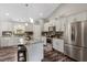 Modern kitchen with granite countertops, stainless steel appliances, and ample cabinet space at 55 Northdale Ct, Louisburg, NC 27549