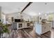 Open concept living space featuring a kitchen island, dining area and living area at 55 Northdale Ct, Louisburg, NC 27549