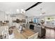 Open floor plan with kitchen, dining, and living areas, ideal for entertaining at 55 Northdale Ct, Louisburg, NC 27549