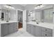 Spacious bathroom with double vanity, walk in closet, large tub, and tile flooring at 5900 Orchid Valley Rd, Raleigh, NC 27613