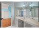 Bathroom with striped walls, a vanity, and access to a bedroom at 5900 Orchid Valley Rd, Raleigh, NC 27613