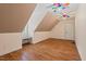 Neutral bedroom with bonus built in desk and colorful ceiling fan for personality at 5900 Orchid Valley Rd, Raleigh, NC 27613