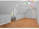 An additional bedroom with hardwood floors, window bench, and a neutral paint at 5900 Orchid Valley Rd, Raleigh, NC 27613