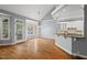 Open concept living area with access to a kitchen, dining, and outdoor deck at 5900 Orchid Valley Rd, Raleigh, NC 27613