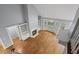A high-ceiling living room with hardwood floors and fireplace at 5900 Orchid Valley Rd, Raleigh, NC 27613
