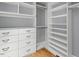 Organized walk-in closet with custom shelving and drawers, maximizing storage space at 5900 Orchid Valley Rd, Raleigh, NC 27613