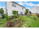Spacious backyard with a garden and patio area, ideal for gardening and outdoor activities at 6102 Coronado Ln, Durham, NC 27713