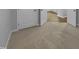 Bedroom with neutral carpet and white doors and trim at 611 Atticus Way, Durham, NC 27703