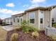 Exterior of a house with a patio and lush landscaping at 611 Atticus Way, Durham, NC 27703