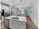 Modern kitchen with granite countertops, stainless steel appliances, and island at 611 Atticus Way, Durham, NC 27703