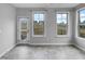 Living room with views of the backyard and a glass door to the patio at 611 Atticus Way, Durham, NC 27703