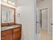 Bathroom featuring granite countertops and wood cabinetry at 642 Bear Tree Creek, Chapel Hill, NC 27517