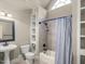 Bathroom featuring a vanity sink, toilet, bathtub with shower, and built-in shelving at 642 Bear Tree Creek, Chapel Hill, NC 27517